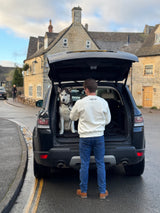 Back of Men's Tundra Fleece Jumper with Range Rover and Siberian Husky in view