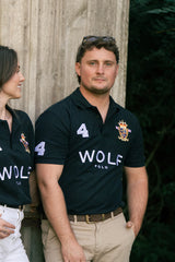 Men's Black Wolf Polo Shirt Front View with Signature Emblem