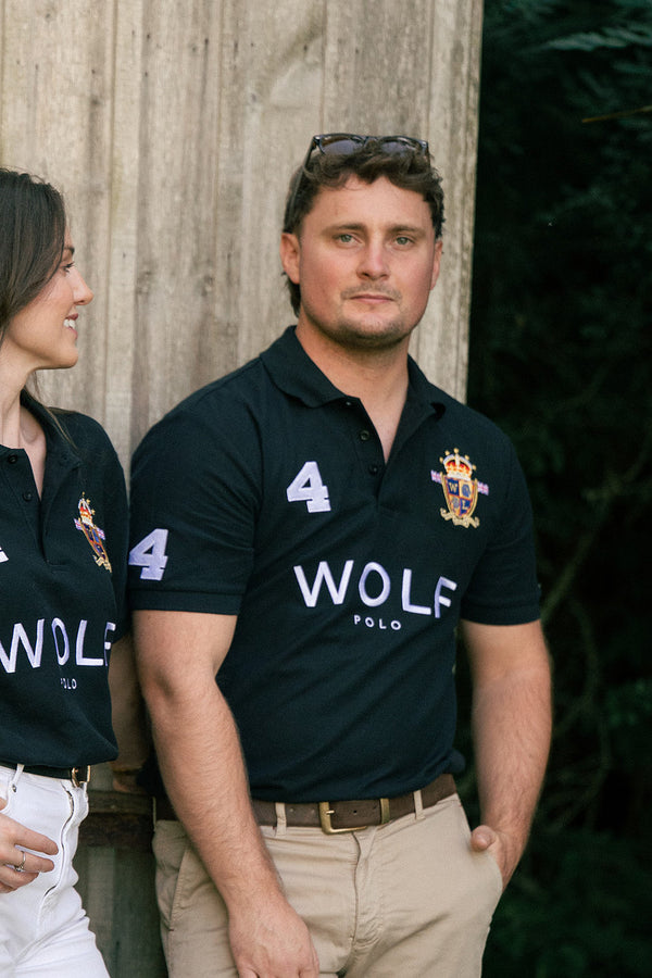 Men's Black Wolf Polo Shirt Front View with Signature Emblem