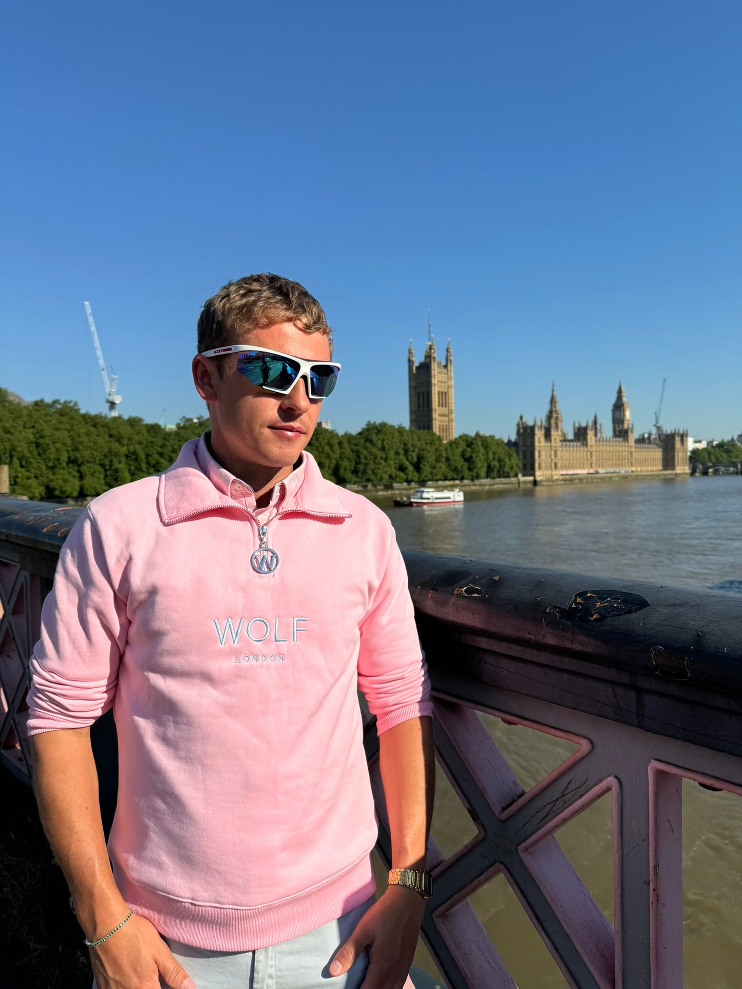 Men's Pink Quarter Zip Front Side View Stood in front of Big Ben London