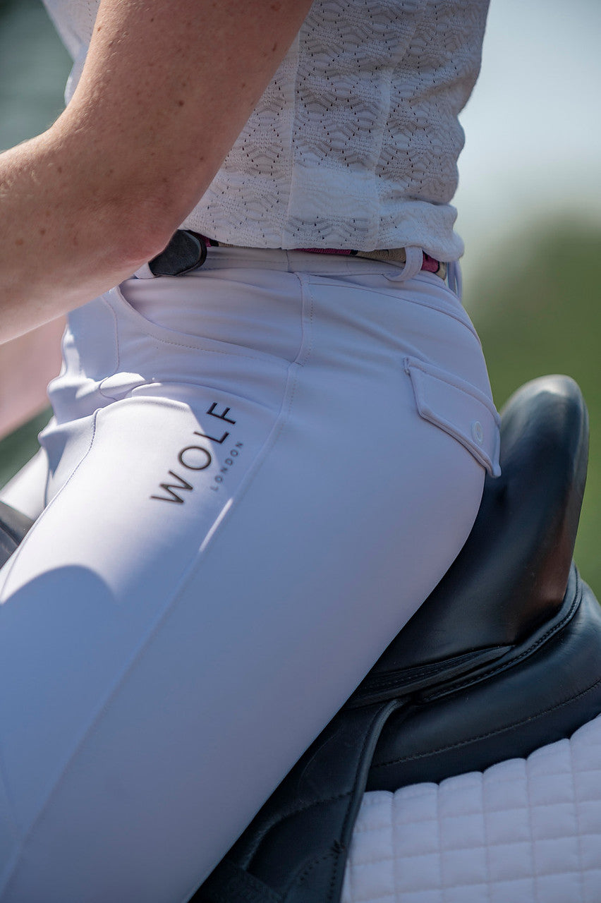 Saddle Side View of White Riding Tights 