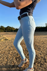 Wolf Equestrians Women's Blue Four Way Stretch Riding Leggings Close Up 