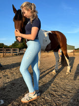 Wolf Equestrians Women's Blue Four Way Stretch Riding Tights Side View Close Up