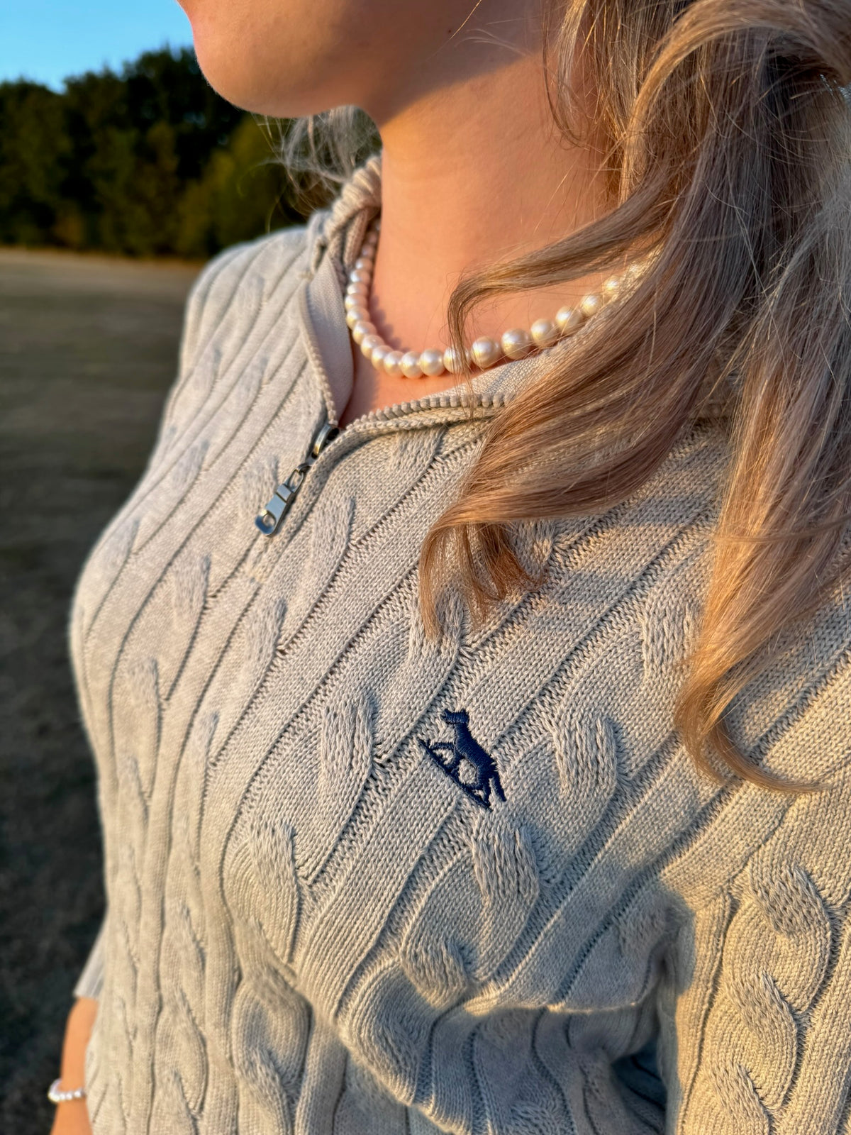 Women's Grey Cable knit Quarter Zip Jumper Logo Close Up With Pearl Necklace 
