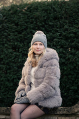 Women's Grey Faux Fur Coat  wearing Grey Faux Fur Hat