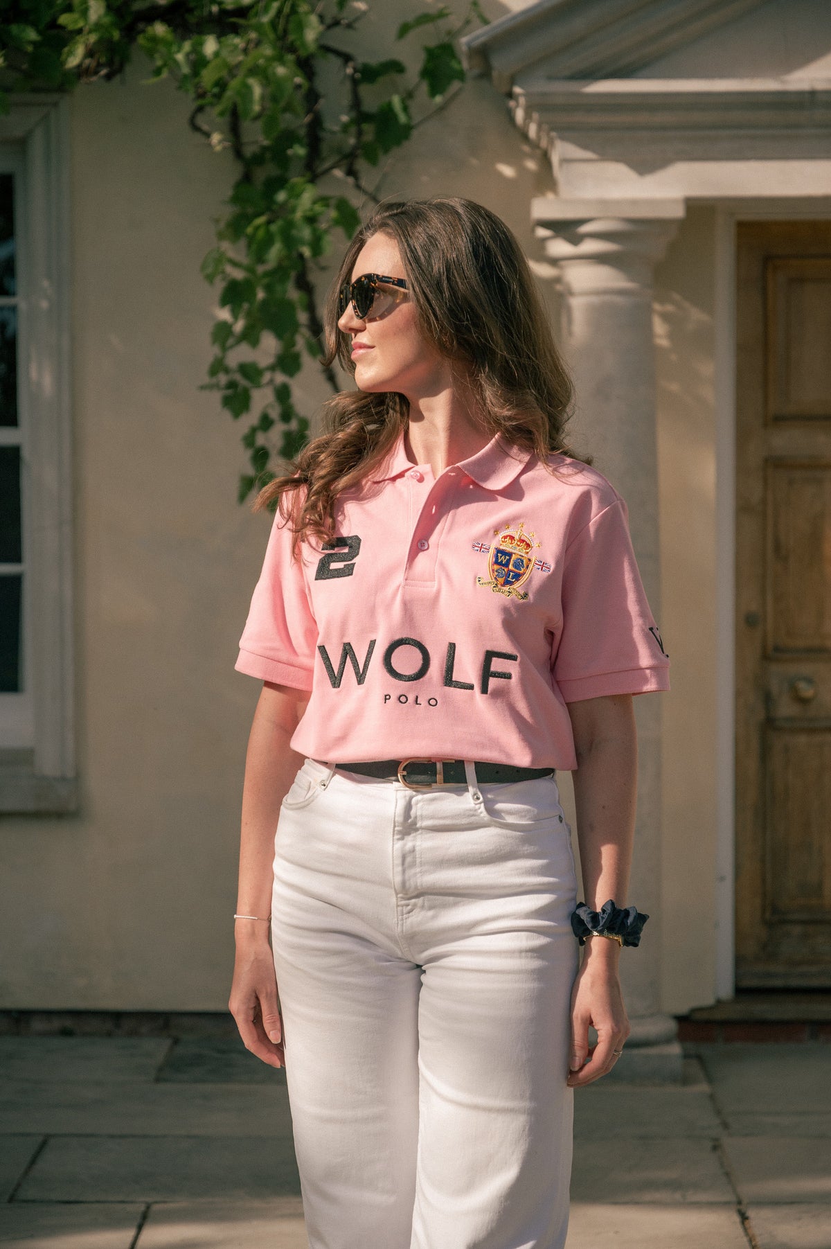 Women's Pink Polo from Wolf London Clothing with Embroidered Emblem, Wolf Polo Text and the number 2