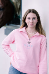 Women's pink quarter zip front view with toggle